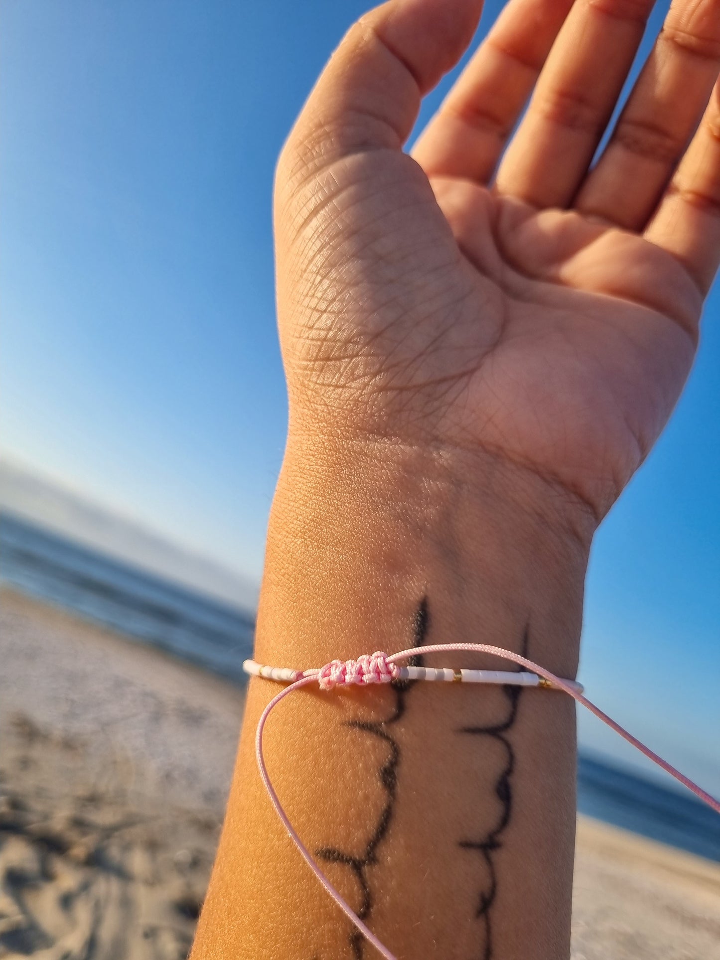 Pulsera miyuki tonos rosado y gris corazón