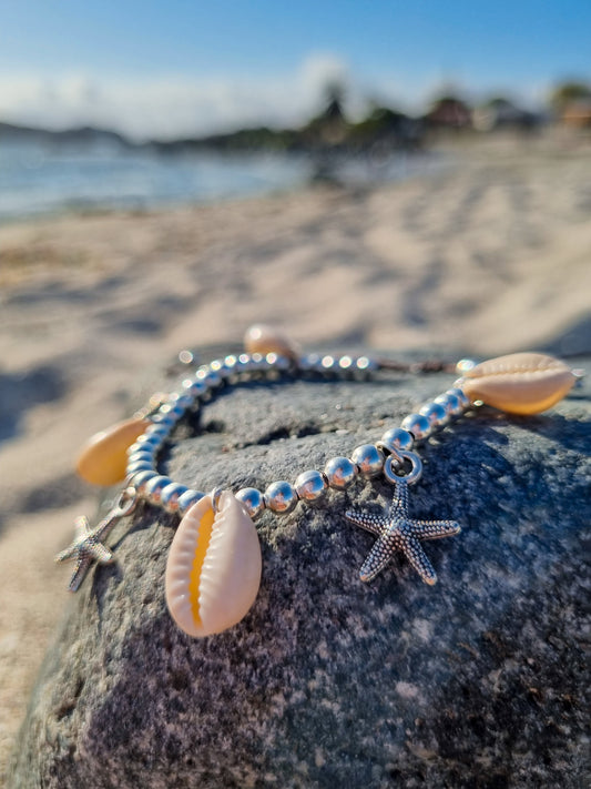 Tobillera fantasía de conchitas con estrellitas de mar